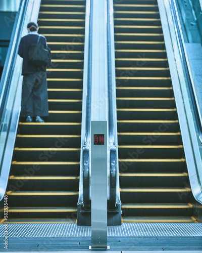 people on escalator