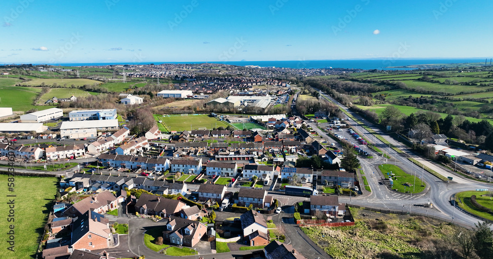 Aerial view of Residential homes and business in Millbrook Larne in County Antrim Northern Ireland