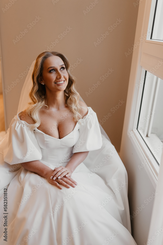 Fototapeta premium beautiful woman getting ready for her wedding