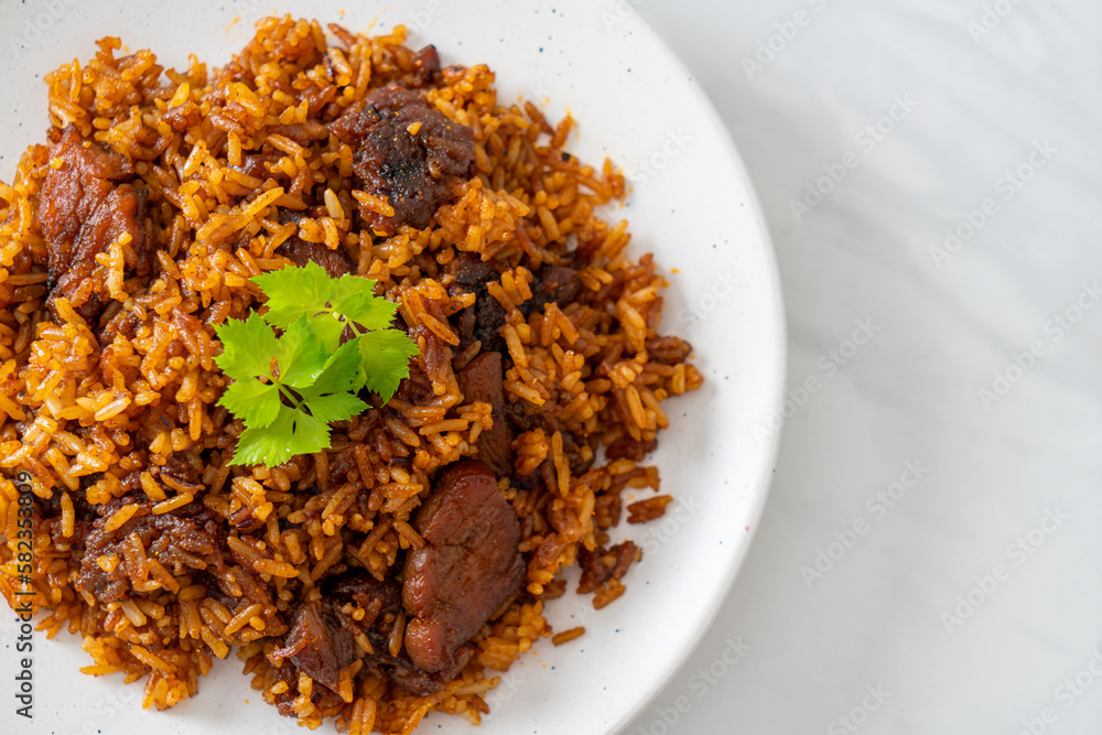 Nasi goreng - fried rice with pork in Indonesia style Nasi goreng - fried rice with pork in Indonesia style