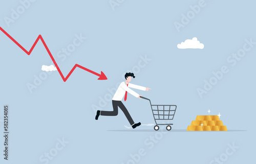 Low investor confidence, investing in gold during recession, safe haven asset against inflation concept, Businessman with shopping cart running away from downtrend graph attack and trying to buy gold.