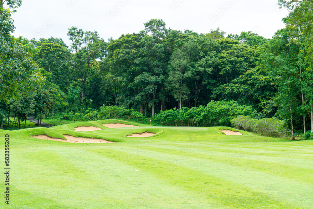 Green with Sand bunkers on Golf course Green with Sand bunkers on Golf course