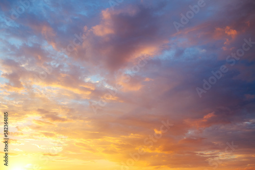 Fototapeta Naklejka Na Ścianę i Meble -  Utterly spectacular sunset with colorful clouds lit by the sun. Bright epic sky.