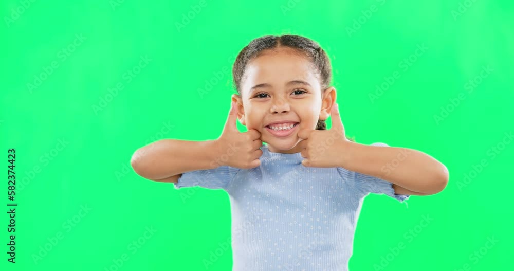 Thumbs up, green screen and happy child in agreement excited, winning and girl kid isolated in studio background. Yes, approval and portrait of young person with yes hands, gesture or sign Thumbs up, green screen and happy child in agreement excited, winning and girl kid isolated in studio background. Yes, approval and portrait of young person with yes hands, gesture or sign