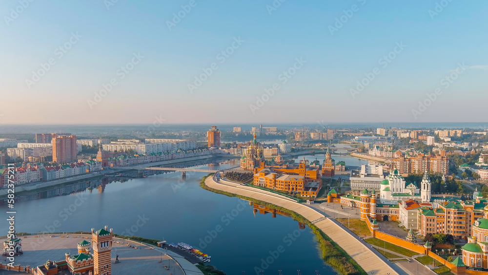 Yoshkar-Ola, Russia. City center in the morning light. Embankment of the river Malaya Kokshaga, Aerial View
