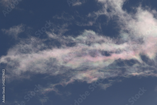Iridescent clouds on a blue sky