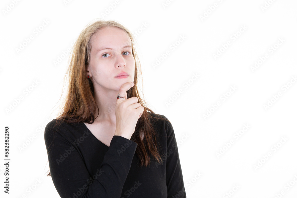 Cheerful blonde woman dreaming pensive looking touching chin with hand finger on white background Cheerful blonde woman dreaming pensive looking touching chin with hand finger on white background