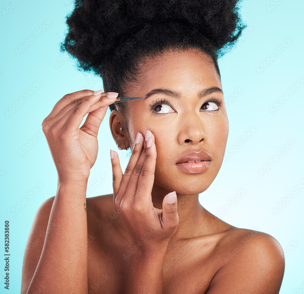 Φωτογραφία Beauty, hair removal and eyebrows with black woman and tweezer in studio for cosmetics, grooming and self care