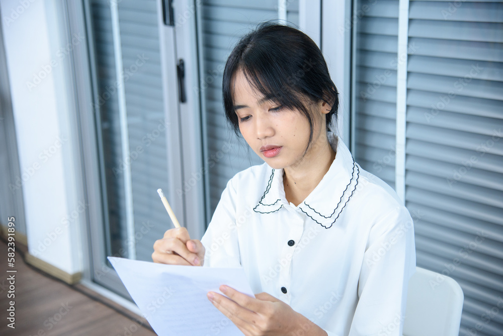 female student sitting taking notes music teacher. female student sitting taking notes music teacher.