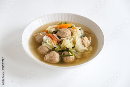 Meatball and vegetables soup in bowl