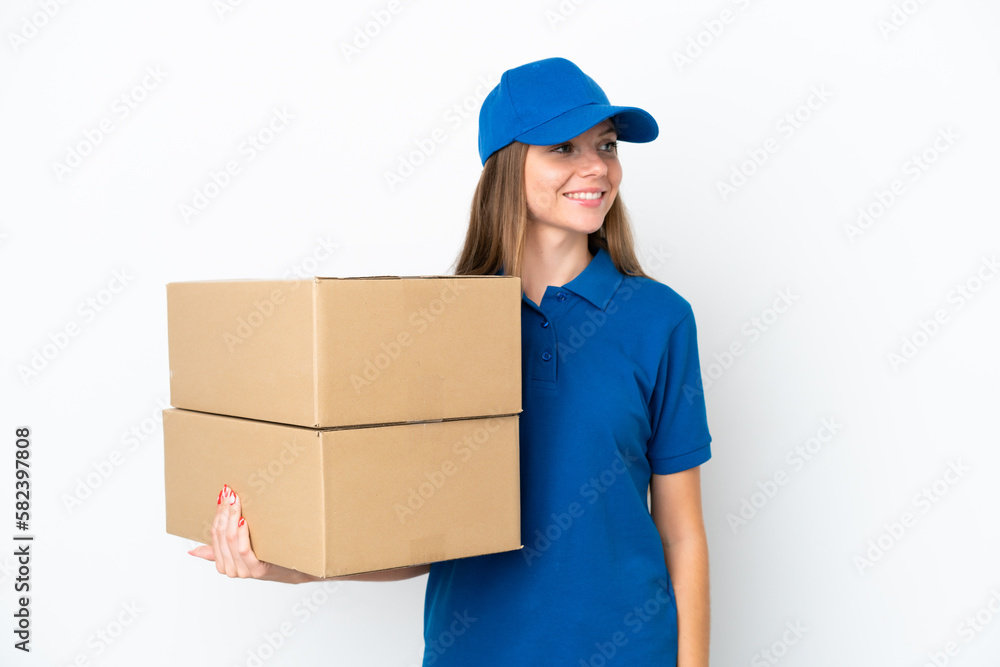 Delivery Lithuanian woman isolated on white background looking side Delivery Lithuanian woman isolated on white background looking side