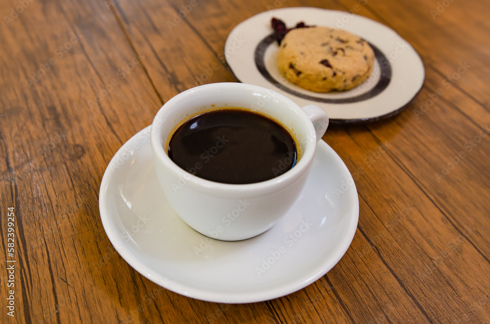 Coffee and cranberry cookies on a wooden table Coffee and cranberry cookies on a wooden table