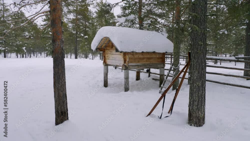 Western Siberia, the camp of the reindeer herders of the Khanty people: a food storage warehouse. Western Siberia, the camp of the reindeer herders of the Khanty people: a food storage warehouse.