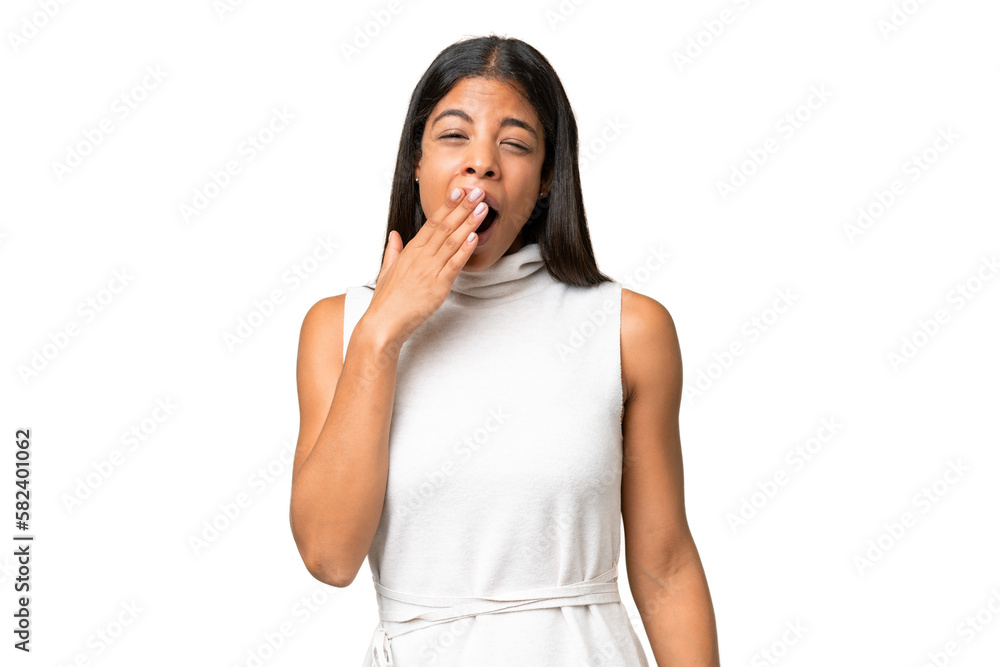 Young African american woman over isolated background yawning and covering wide open mouth with hand Young African american woman over isolated background yawning and covering wide open mouth with hand