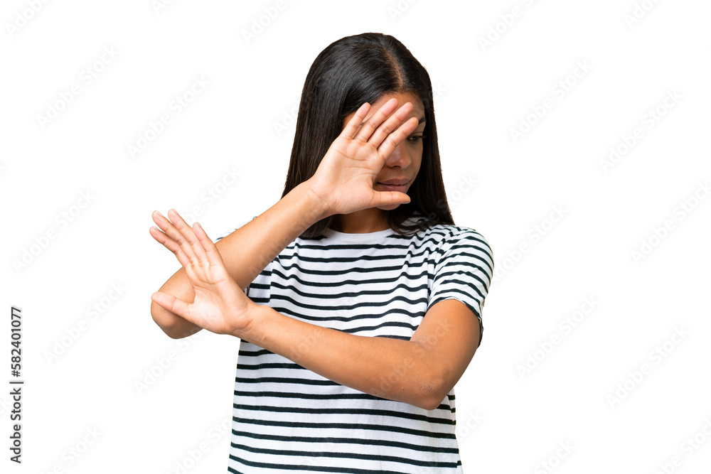Young African american woman over isolated background nervous stretching hands to the front Young African american woman over isolated background nervous stretching hands to the front