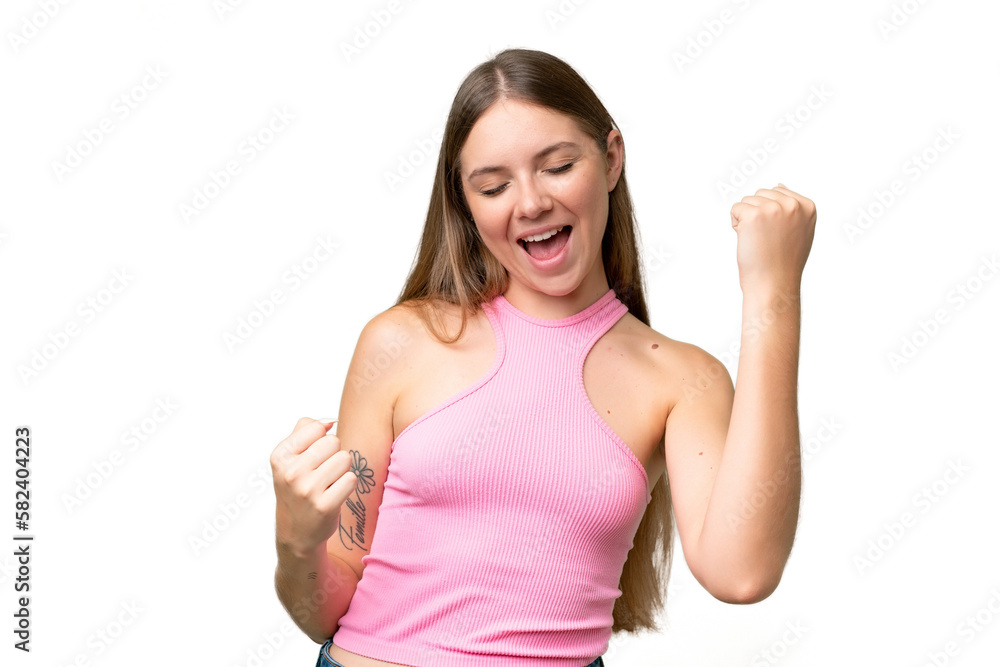 Fototapeta premium Young beautiful blonde woman over isolated background celebrating a victory