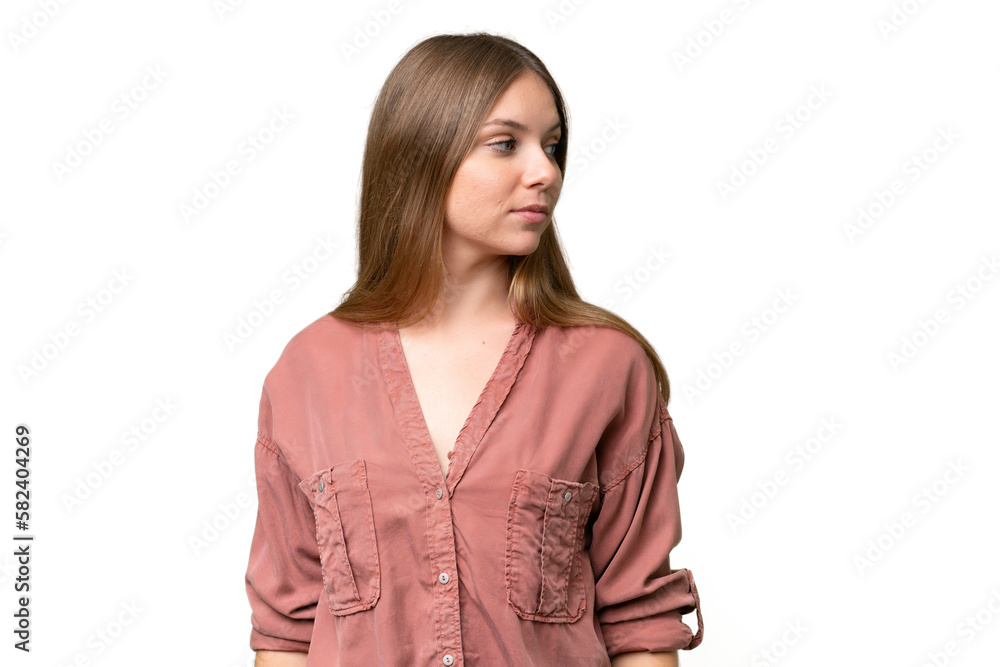Young beautiful blonde woman over isolated background looking to the side Young beautiful blonde woman over isolated background looking to the side