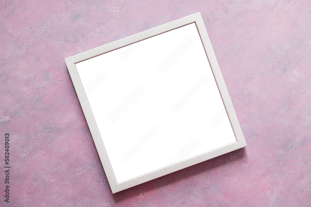 white square picture frame mock-up with copy space for yout text or image on top of pink background white square picture frame mock-up with copy space for yout text or image on top of pink background