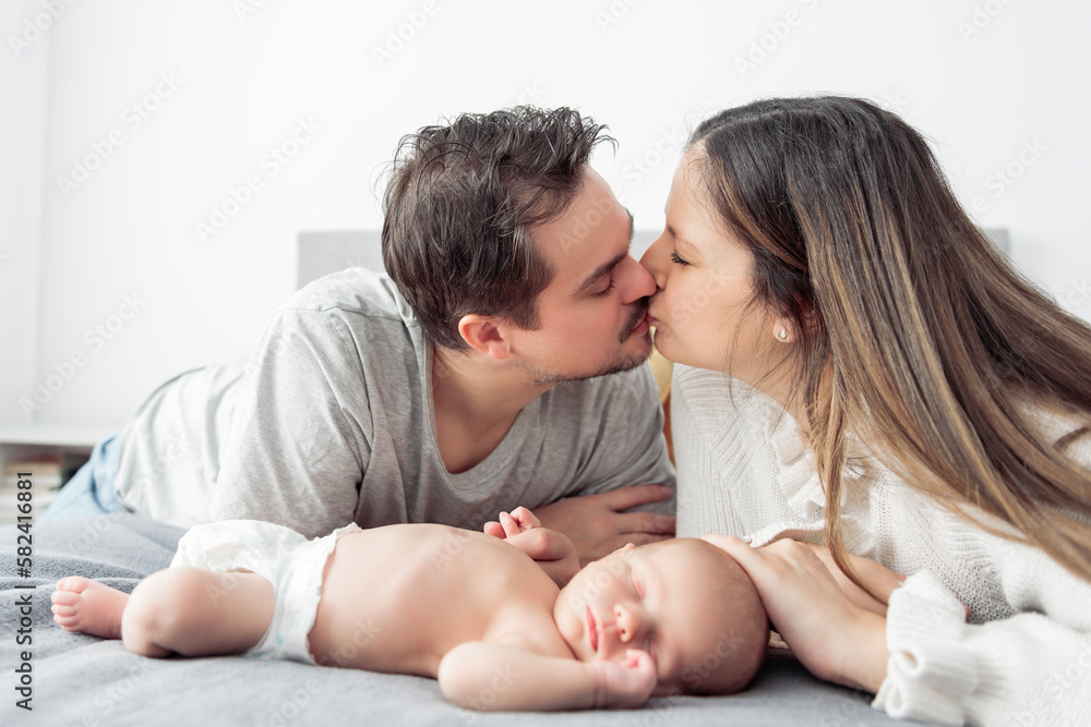 A Portrait of a beautiful mother, with her nursing baby A Portrait of a beautiful mother, with her nursing baby