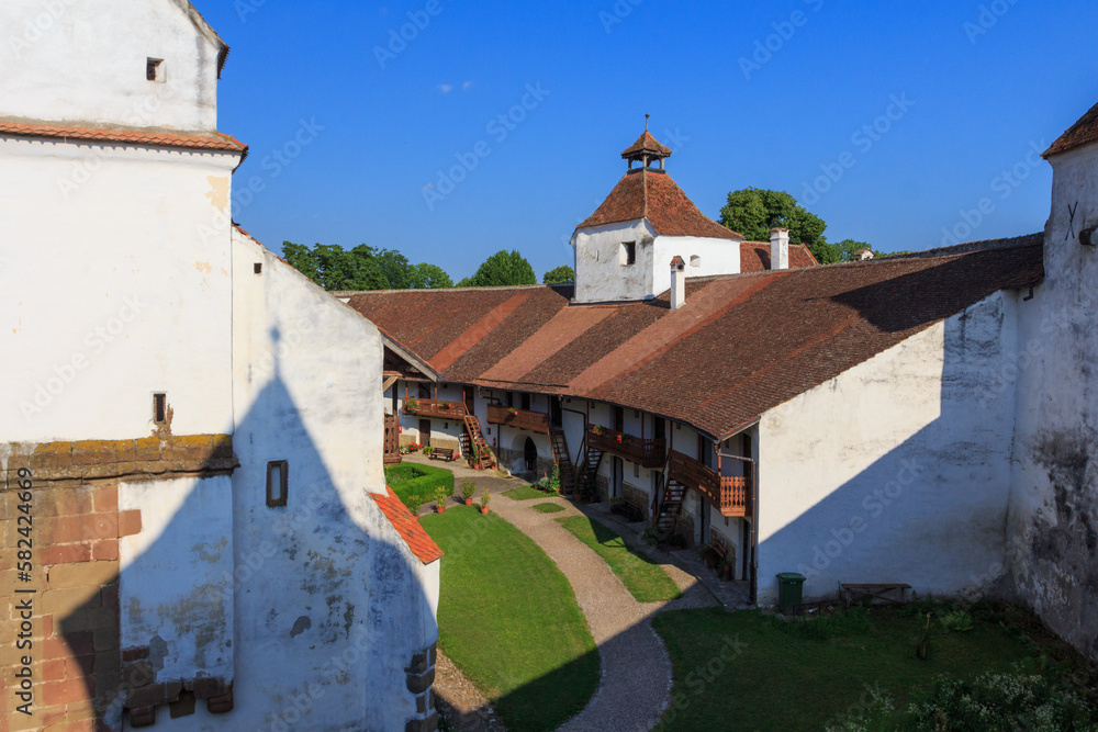 A view of the rooms in the protective walls of the historical Church-fortress in the city of Harman. Transylvania. Romania