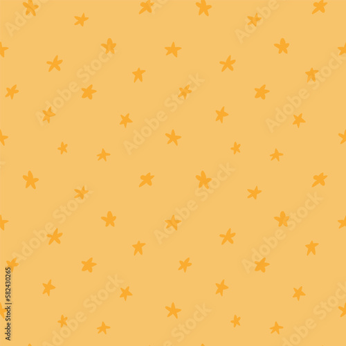 Scattered stars simple seamless pattern, yellow background. Hand drawn style vector illustration. Childish texture. Design concept for kids fashion print, textile, fabric, bedroom wallpaper, packaging