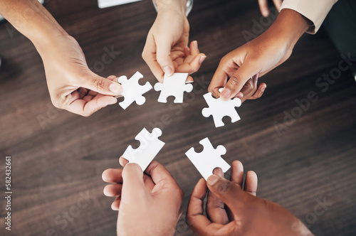 Business people, hands or puzzle for teamwork, solution problem solving with planning, synergy or collaboration. Jigsaw, growth or partnership support, project development or community group mission