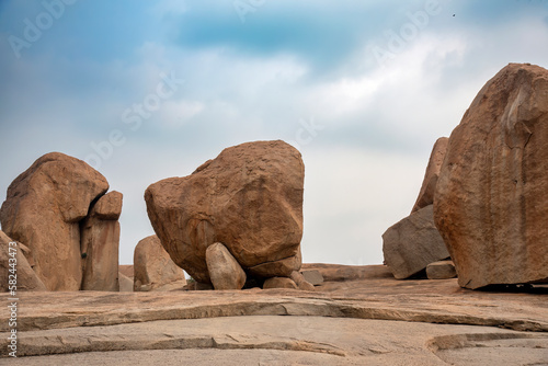 Beautiful view of boulder strewn landcape and ruins Hampi photo