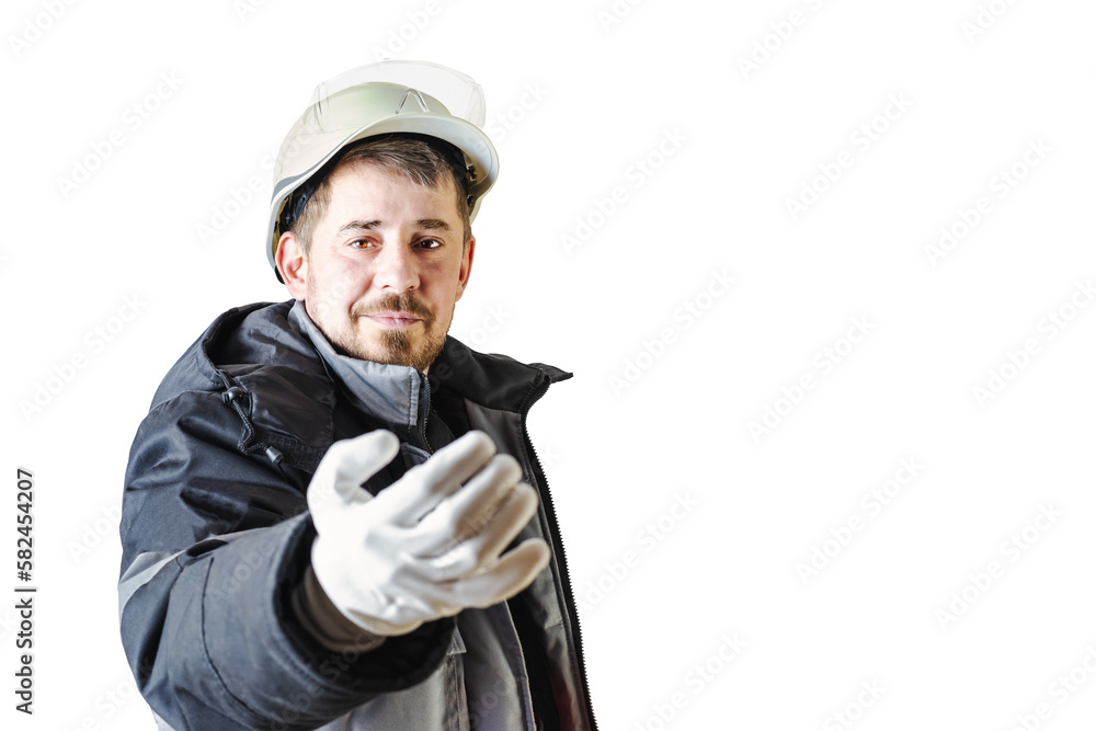 Positive friendly bearded male builder in a warm jacket, hardhat and goggles. Shows a hand gesture. Isolated background. Positive friendly bearded male builder in a warm jacket, hardhat and goggles. Shows a hand gesture. Isolated background.