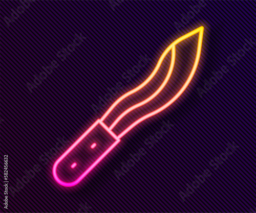 Glowing neon line Machete or big knife icon isolated on black background. Vector