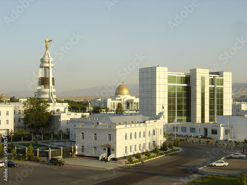 Downtown white buildings skyline with sky and copy space in city landscape of Ashgabat Turkmenistan photo