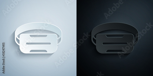 Paper cut Virtual reality glasses icon isolated on grey and black background. Stereoscopic 3d vr mask. Optical head mounted display. Paper art style. Vector