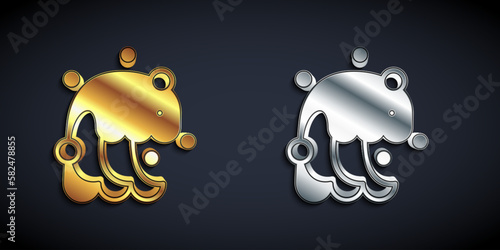 Gold and silver Tsunami icon isolated on black background. Flood disaster. Stormy weather by seaside, ocean or sea wave or tsunami. Long shadow style. Vector