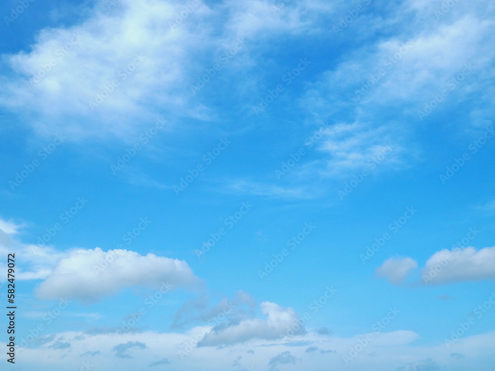 The blue sky and white clouds are natural beauty. The sky with white clouds scattered during the summer day.
The blue sky and white clouds are natural beauty. The sky with white clouds scattered during the summer day.