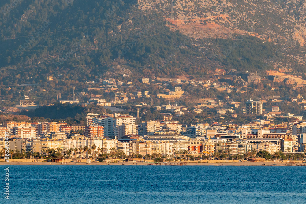 Panoramic view of Alanya and its surroundings with the Mediterranean Sea in the rays of the sunset