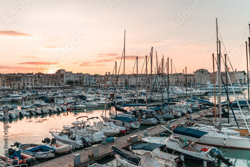 A Pictorial Journey through Trani Harbor at Twilight, puglia, italy photo