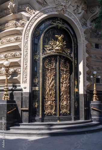 Ornate carved golden door to Centro Naval in Buenos Aires in Argentina