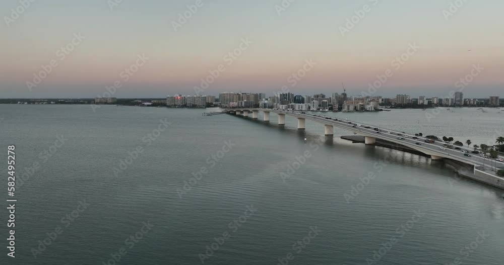 Evening aerial video of the Sarasota, Florida skyline and Ringling Parkway Bridge across Sarasota Bay Evening aerial video of the Sarasota, Florida skyline and Ringling Parkway Bridge across Sarasota Bay