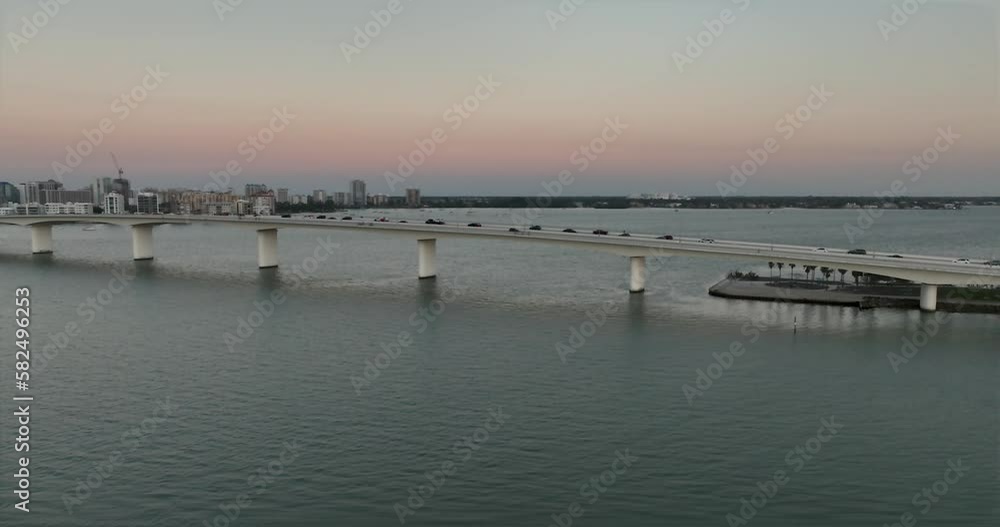 Evening aerial video of the Sarasota, Florida skyline and Ringling Parkway Bridge across Sarasota Bay Evening aerial video of the Sarasota, Florida skyline and Ringling Parkway Bridge across Sarasota Bay