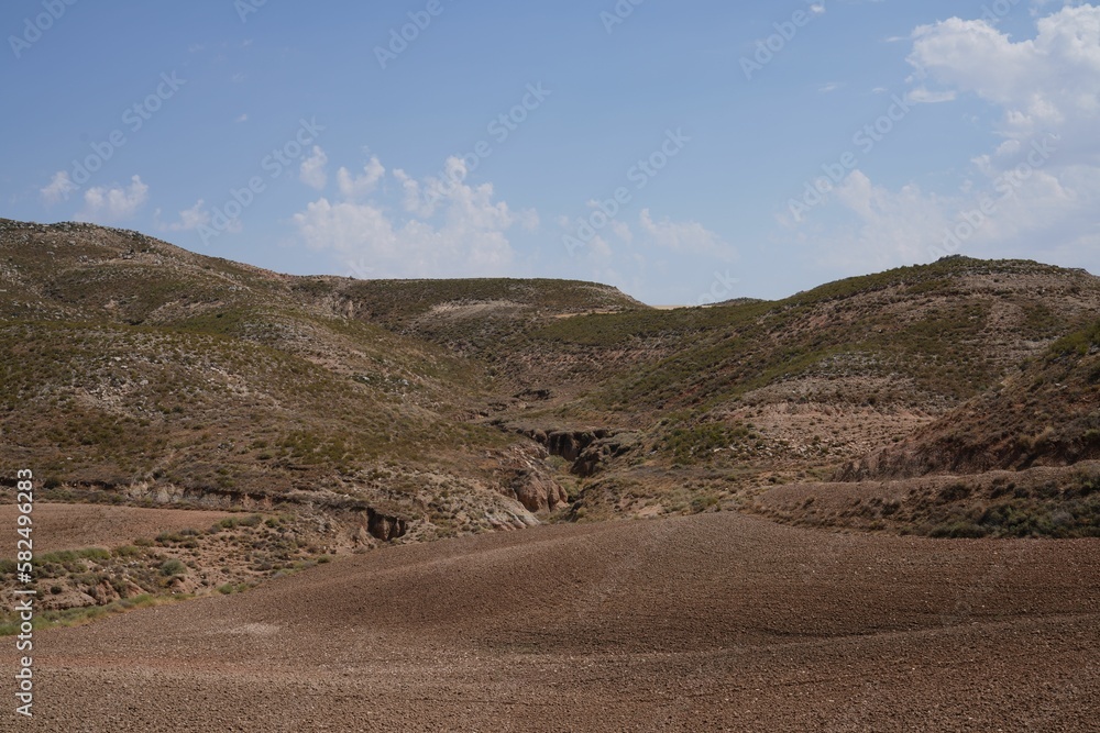 Deserted area landscape with bare hills Deserted area landscape with bare hills