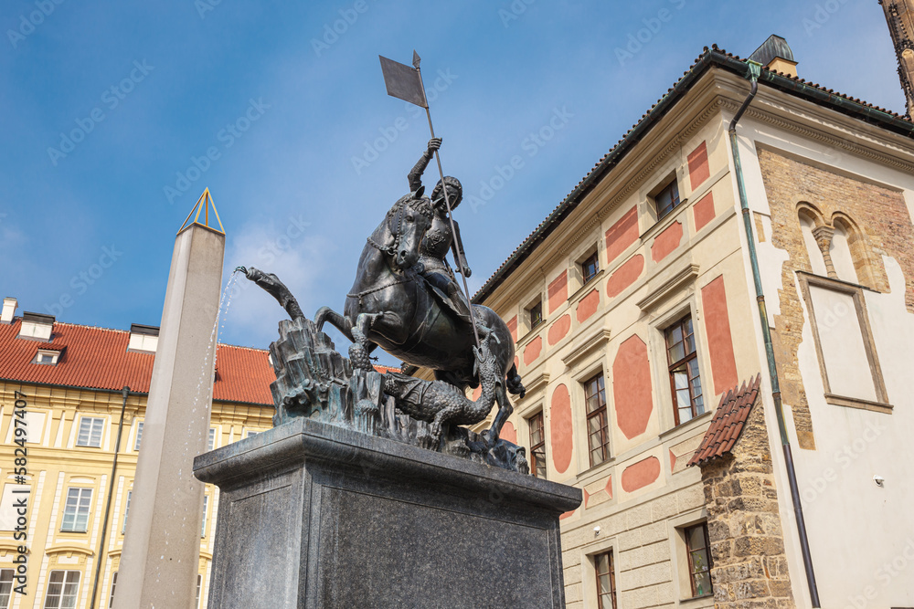 Low angle shot of the statue of Saint George slaying the dragon in Prague, Czech Republic Low angle shot of the statue of Saint George slaying the dragon in Prague, Czech Republic