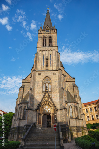 Vertical shot of St. Procopius parish Church (Kostel svateho Prokopa) in Prague, Czech Republic photo