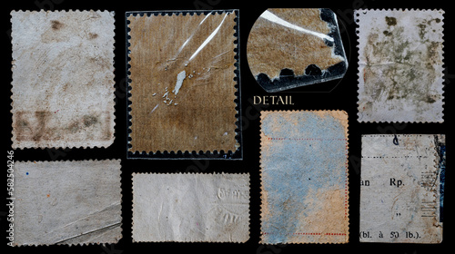 collection of blank vintage postage stamps with different size and texture variation isolated on black background. back side