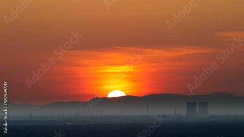 Panorama with Nuclear Power Plant in Philippsburg at sunset, Germany photo