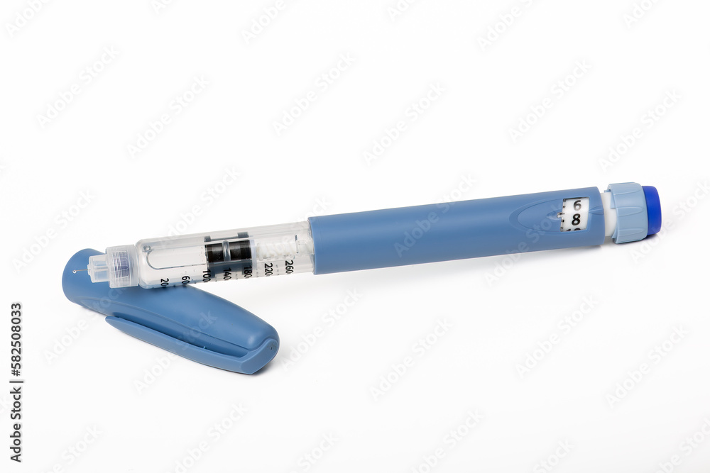 Open Blue Insulin Injection Pen with a Needle on White Background - Essential Medical Device for Diabetes Care Open Blue Insulin Injection Pen with a Needle on White Background - Essential Medical Device for Diabetes Care