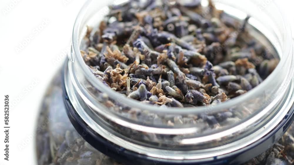 dried lavender flowers close-up in a jar rotate in a circle dried lavender flowers close-up in a jar rotate in a circle