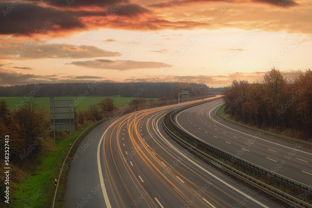 Langzeitbelichtung - Autobahn - Strasse - Traffic - Travel - Background - Line - Ecology - Highway - Night Traffic - Light Trails - Sunset - Sunrise - High quality photo	