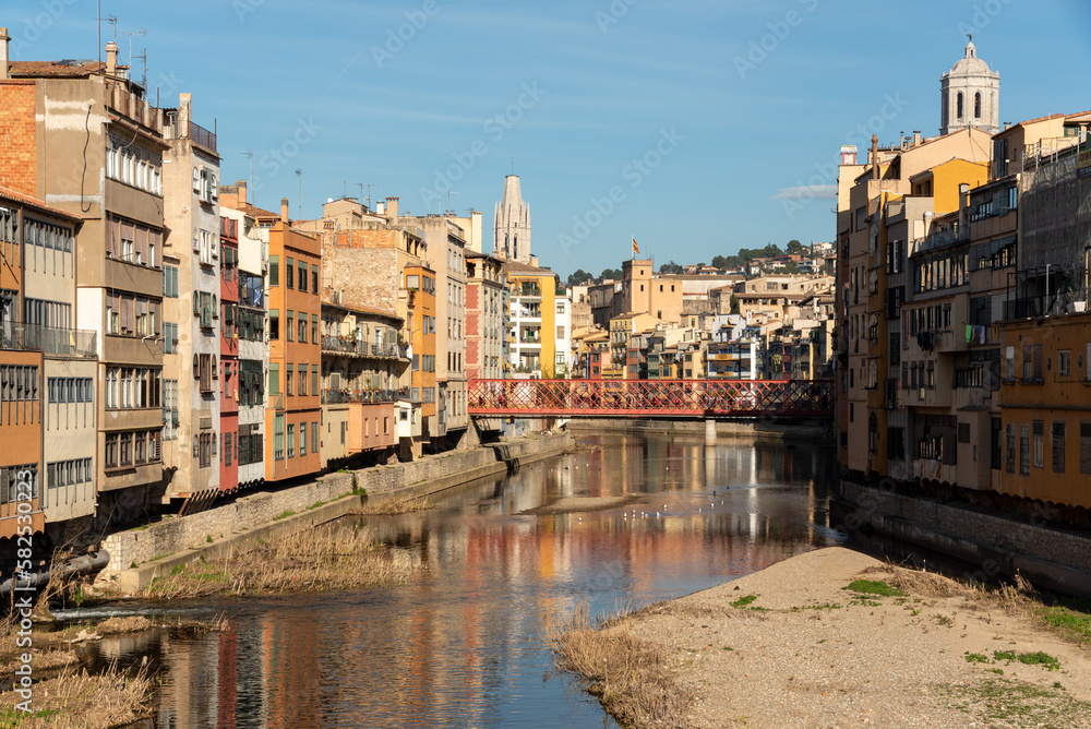 The historic city of Girona in Catalunya, Spain, boasts charming, winding streets and colorful, ancient buildings