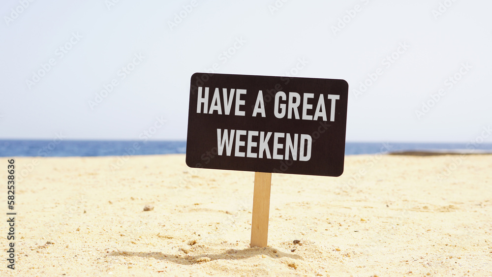 Have a great weekend is shown using the text on the banner on the beach