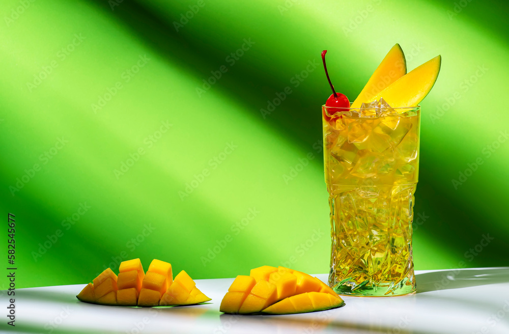 Mango rum collins alcoholic cocktail drink with white rum, syrup