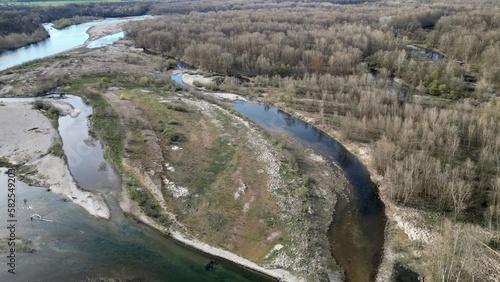 water emergency and drought  due to lack of rain due to global warming and the decrease of glaciers - Drone aerial view of dry river with scarcity of water in Lombardy Pavia - Ticino di Besate 